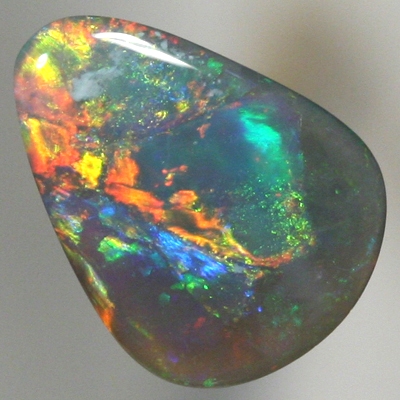 SOLID SEMI BLACK OPAL Flame pattern, red to orange to green. SEE VIDEO